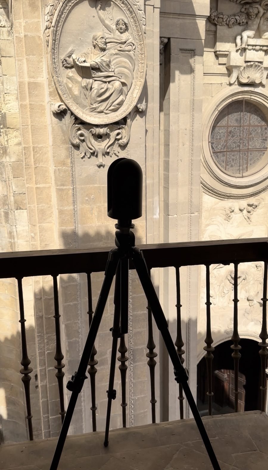 LiDAR scanner capturing carved relief sculpture and window tracery at close range